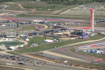 Aerial view of the United States Grand Prix racing circuit in Austin, showcasing the dynamic track layout and event facilities.