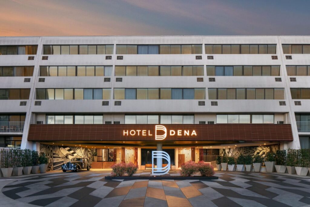 Exterior view of Hotel Dena, a luxury Marriott Tribute Portfolio Hotel, located at 303 Cordova Street in Pasadena, California, ideal for Rose Bowl accommodations.