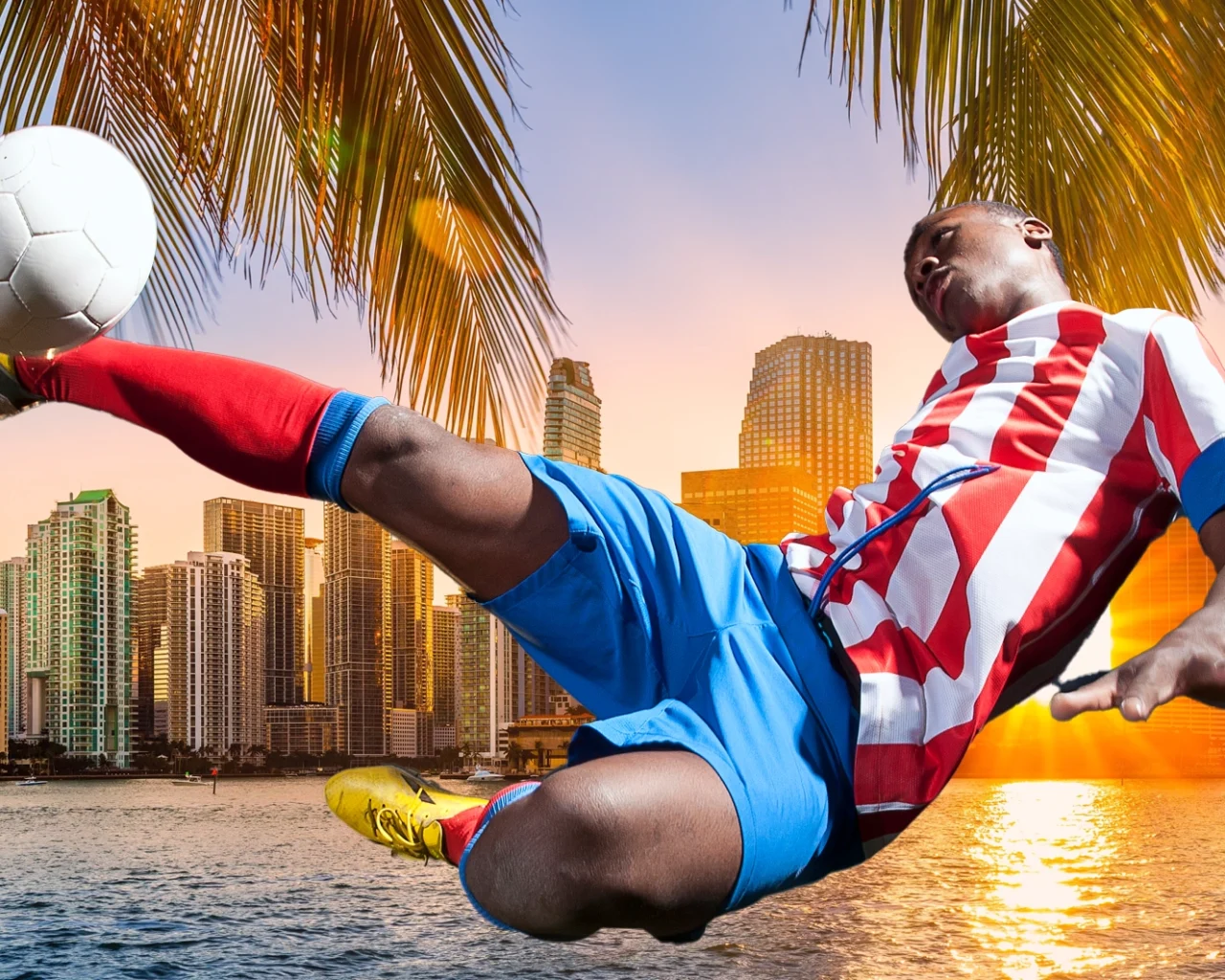 Soccer player in mid-air kick with a Miami skyline backdrop, ideal for soccer travel packages offering hotel and custom experience opportunities.