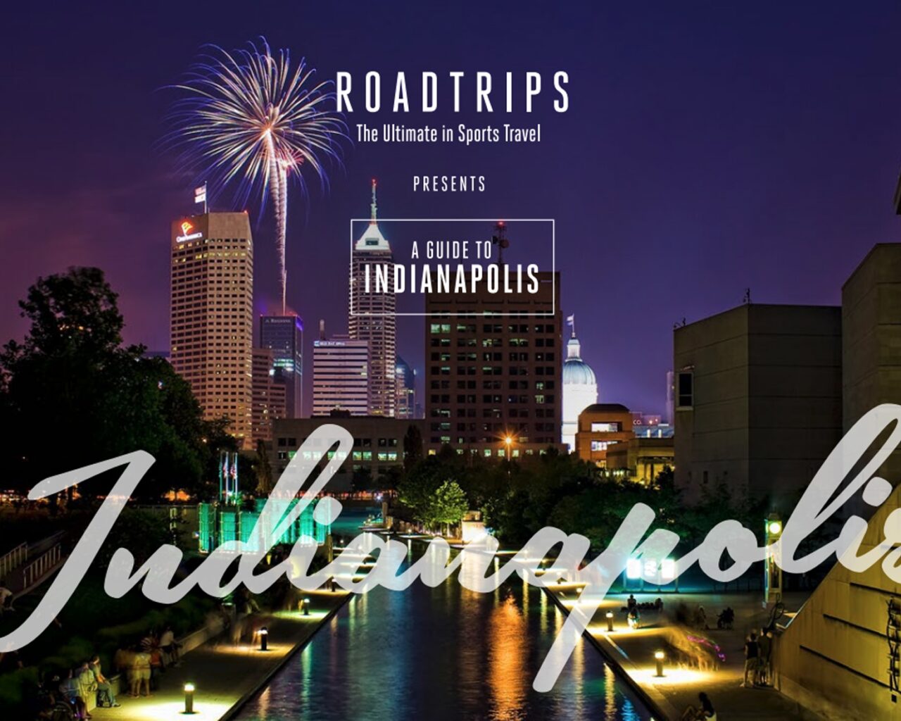 Nighttime view of Indianapolis skyline with fireworks, featuring the text 'Roadtrips Presents A Guide to Indianapolis' for promoting luxury travel and tour packages.