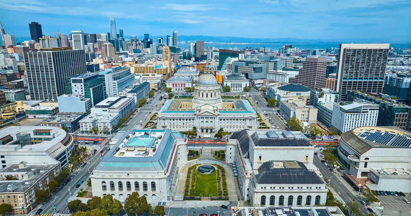 Aerial view over San Francisco showing the City Hall, surrounded by modern and traditional architecture. Ideal for exploring World Cup cities and venues.