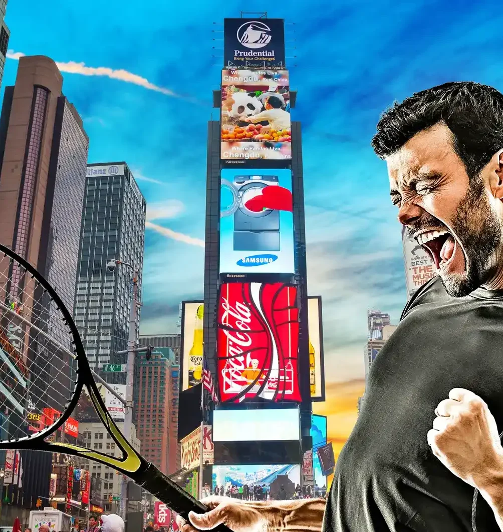 A man celebrates enthusiastically against a backdrop of Times Square, symbolizing the excitement at the US Open Tennis event held in New York.