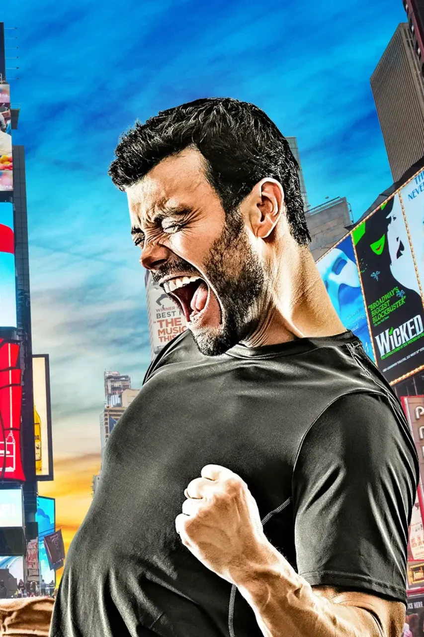 A man celebrates enthusiastically against a backdrop of Times Square, symbolizing the excitement at the US Open Tennis event held in New York.