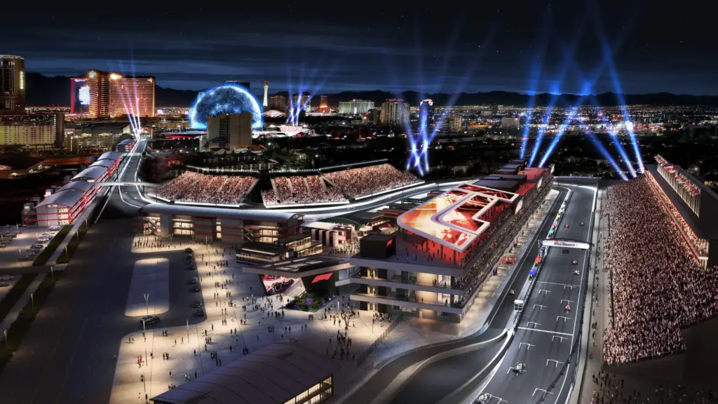 Nighttime rendering of a vibrant Las Vegas street scene featuring massive crowds, illuminated hotels, and a prominent event setup with light beams highlighting the Grand Prix circuit layout.