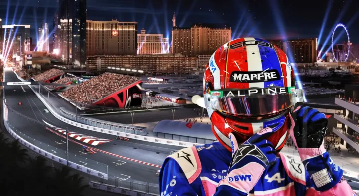 A racing driver in a vibrant helmet and suit overlooks the illuminated Las Vegas Street Circuit at night, capturing the essence of Grand Prix auto racing travel packages.