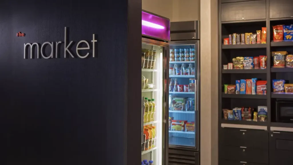 A well-stocked snack market located in the Courtyard Midtown East, New York, featuring a variety of snacks and beverages, ideal for guests visiting for events like the US Open Tennis.