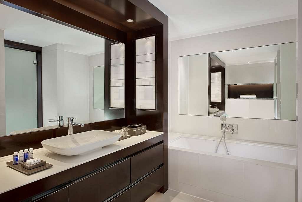 Luxurious bathroom in the Park Plaza Westminster Bridge London, featuring a modern design ideal for guests attending Wimbledon Championships.