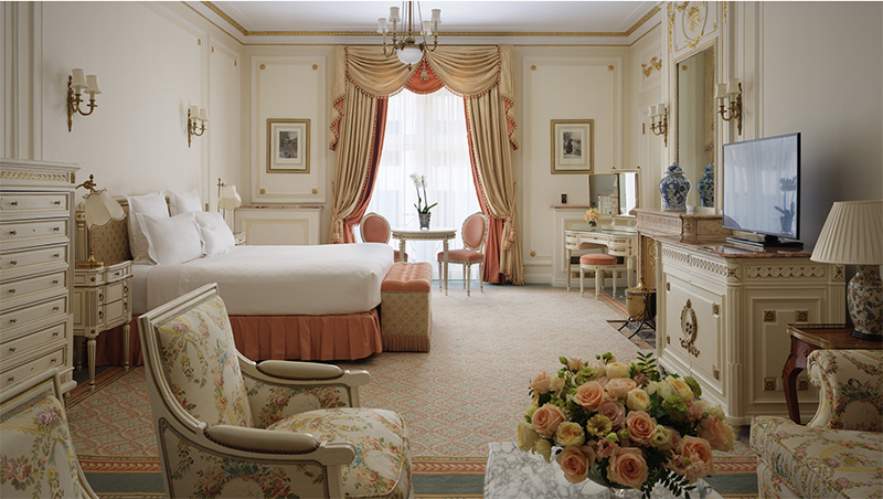 Luxurious guest room at The Ritz London, featuring elegant decor and furnishings, located near Wimbledon accommodations in London, England.