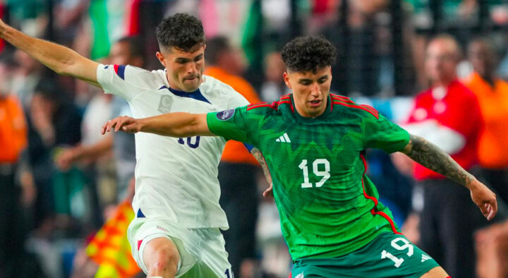 Two soccer players in action during a match, one wearing a white jersey and the other in green, competing for the ball as part of the World Cup Follow Your Team Packages.