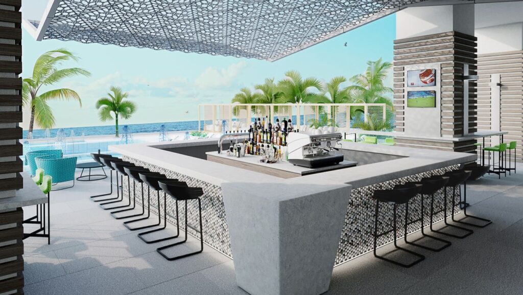 Luxurious poolside bar at the Renaissance Daytona Beach Oceanfront Hotel, featuring a modern bar setup with stools and a beach view, ideal for Daytona Beach hotel patrons.