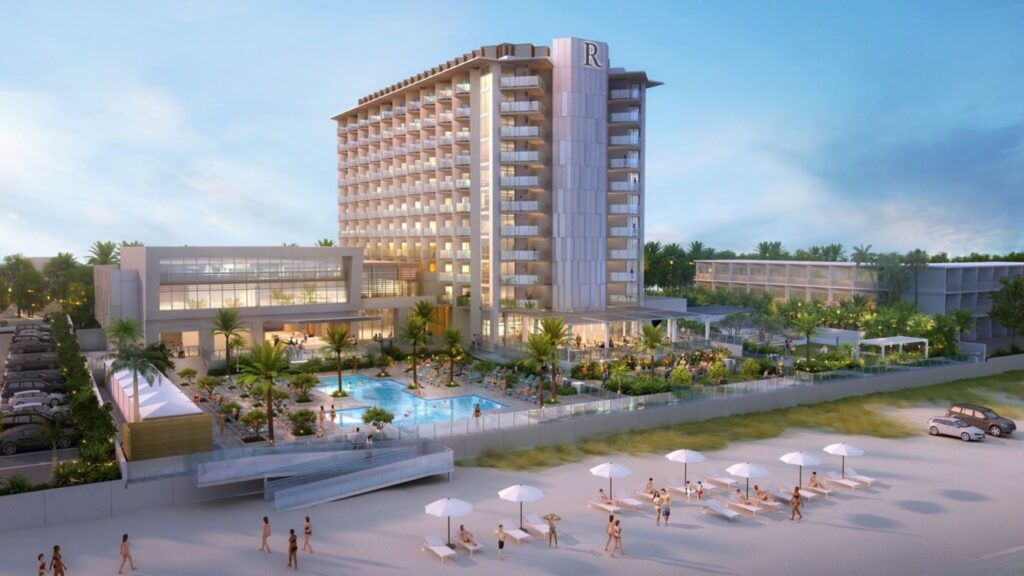 Illustration of the Renaissance Daytona Beach Oceanfront Hotel, showing a multi-story building with balconies, a pool area, and beach access, bustling with people enjoying the sunny setting.