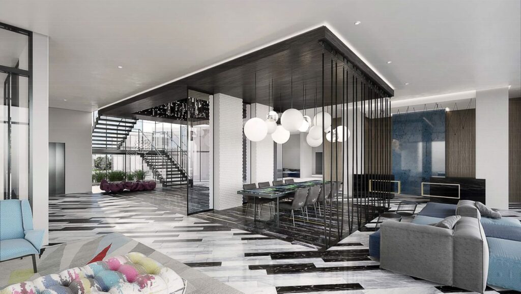 Luxurious lobby of the Renaissance Daytona Beach Oceanfront Hotel featuring modern interior design with geometric patterns, elegant furniture, and sleek staircases, ideal for Daytona Beach hotels near Daytona 500 events.