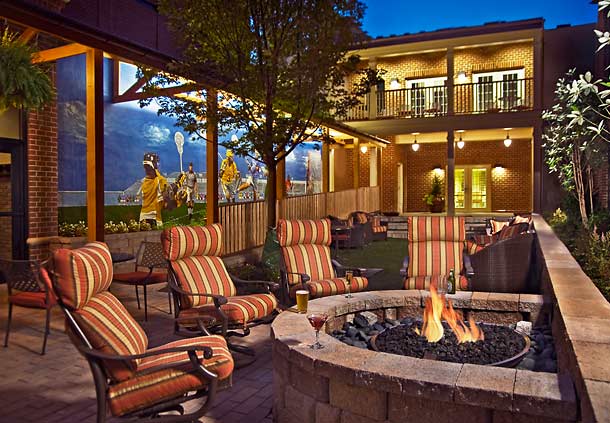 Inviting outdoor seating area with a fire pit at Fairfield Inn & Suites Baltimore Downtown/Inner Harbor, ideal for visitors seeking hotels near the Preakness Stakes at Pimlico Race Course.
