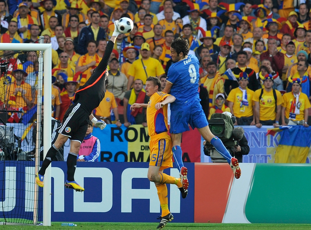 Soccer players compete for the ball during a corner kick at a stadium, surrounded by vibrant, packed stands, illustrating the dynamic action and excitement typically seen at major events like the Club World Cup Opening Match in Miami.