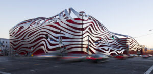 A side view of the modern architecture of the Petersen Automotive Museum Los Angeles